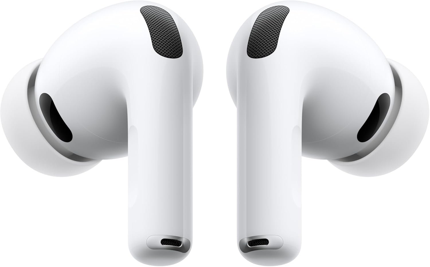 White Apple AirPods Pro earbuds displayed side by side against a light background, featuring silicone ear tips, short stems with black acoustic vents, and mesh speaker grilles on the top and bottom.