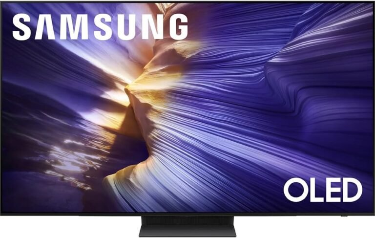 Samsung OLED 4K S90F TV displaying a vivid purple and gold abstract canyon image on an ultra thin bezel screen.